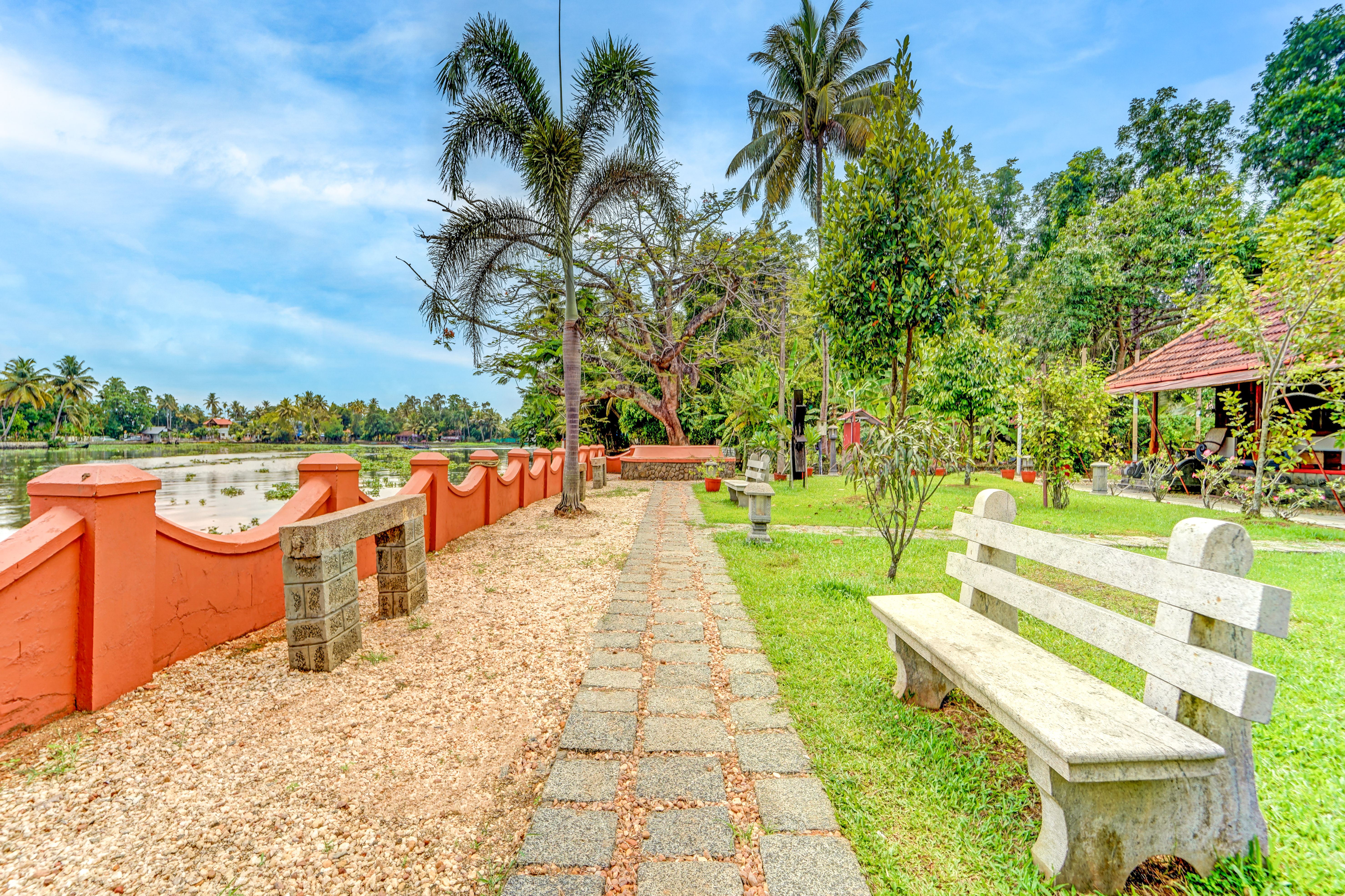 Palm Dale Premium Room | Heritage Riverside Escape with Garden & Restaurant - Image 4